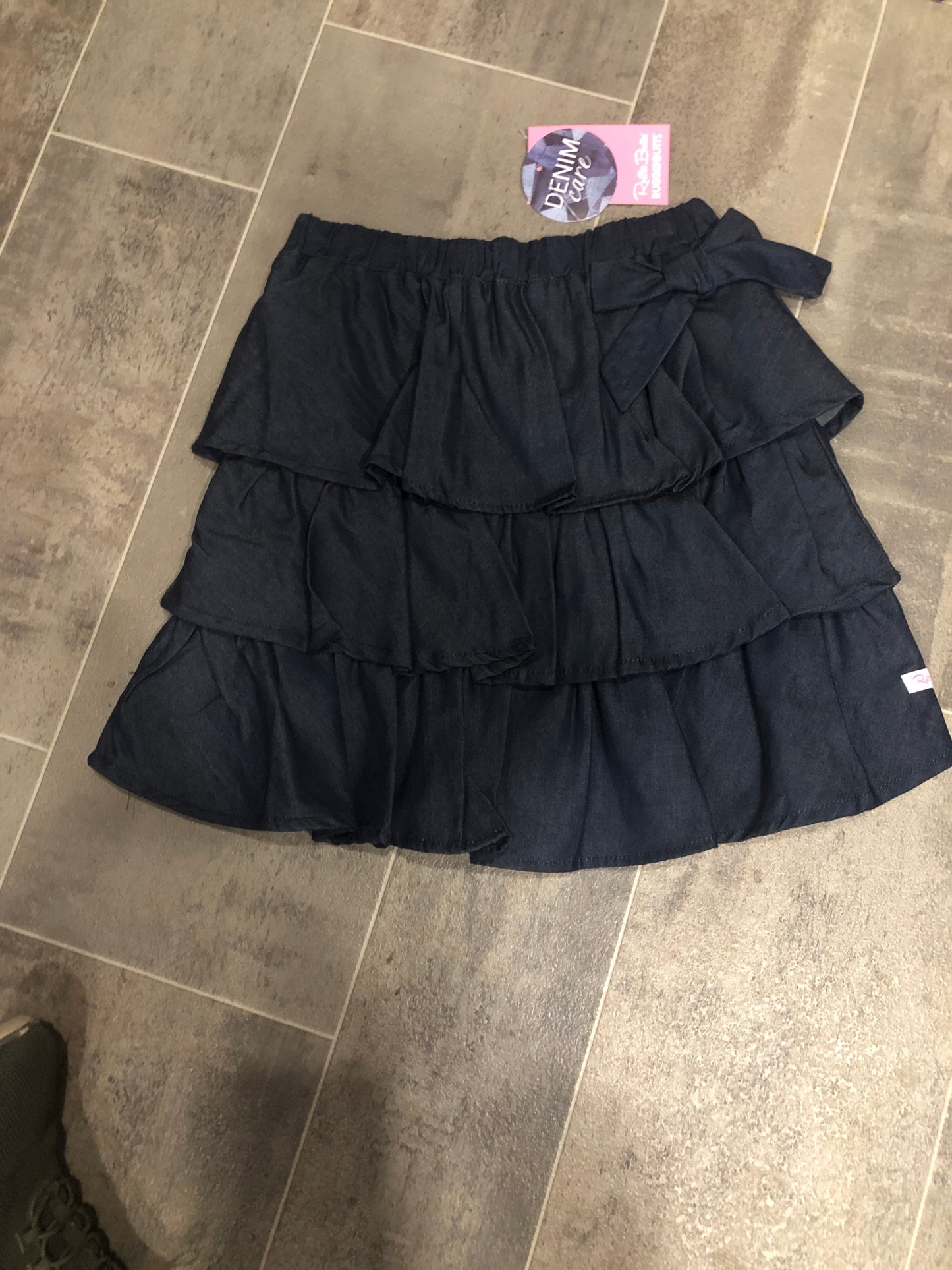 Girls Ruffled Dark Wash Denim Bow Skirt by RuffleButts