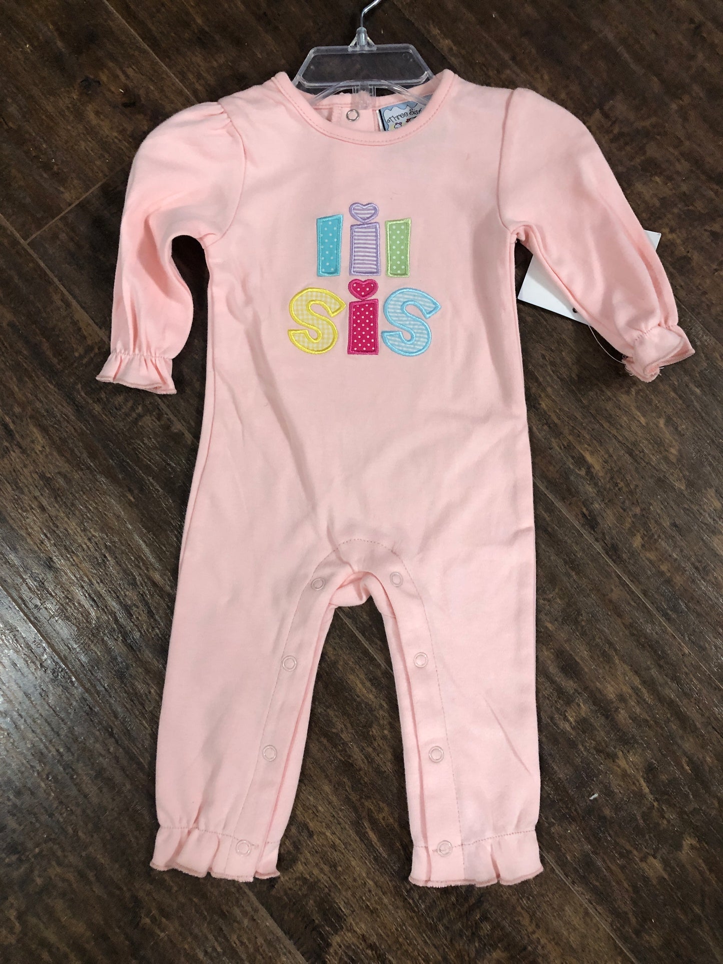 Girls Pink "Lil Sis" Romper by Three Sisters