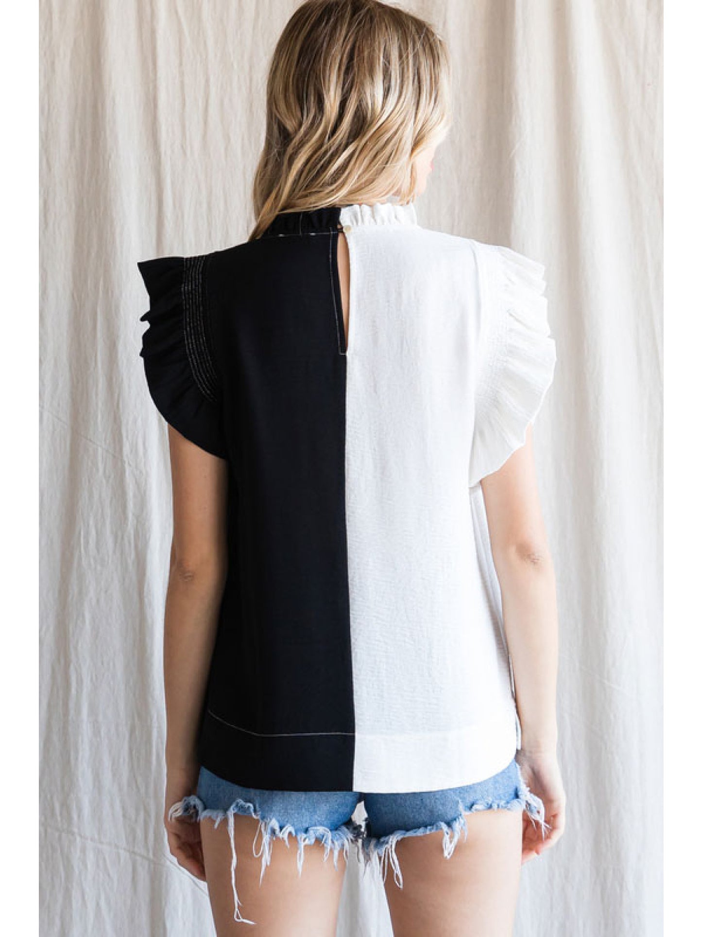 Ladies Colorblock Top With Frilled Neck And Ruffled Shoulder by JODIFL-Black/White