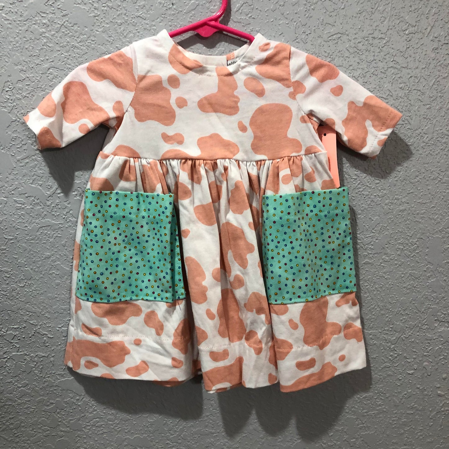 Girls Cowprint 3/4 Sleeve Dress with Oversize Pockets by Ladybug Dezignz
