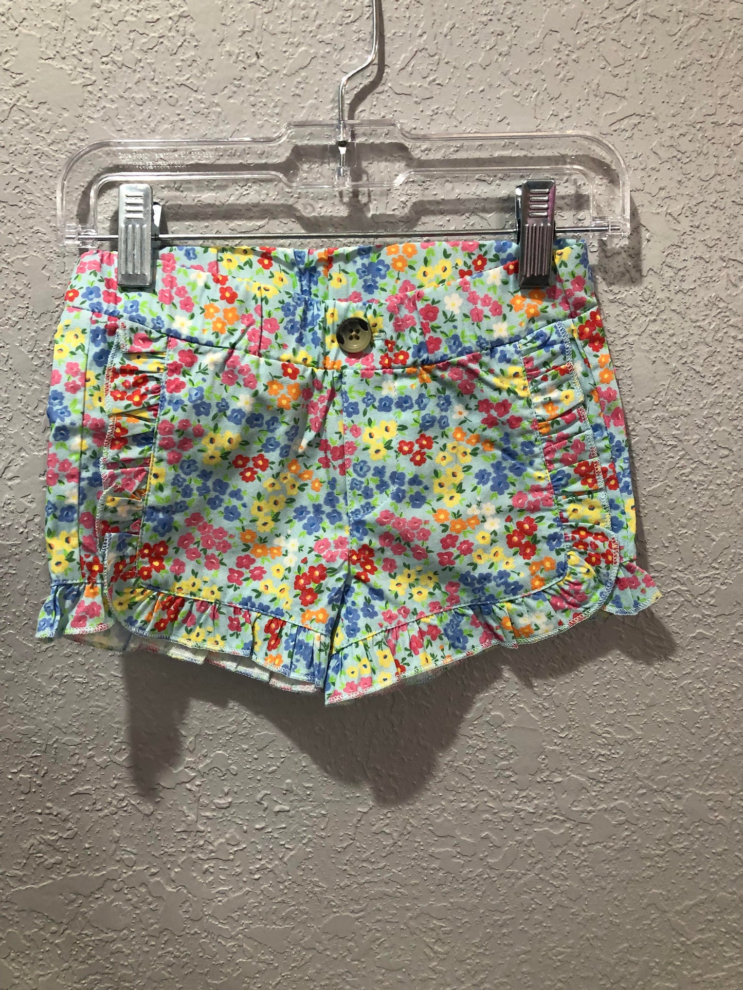 Girls Petaling Around Ruffle Woven Shorts by RuffleButts